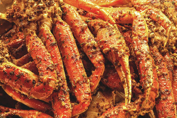 Crab legs with seasoning oil and butter