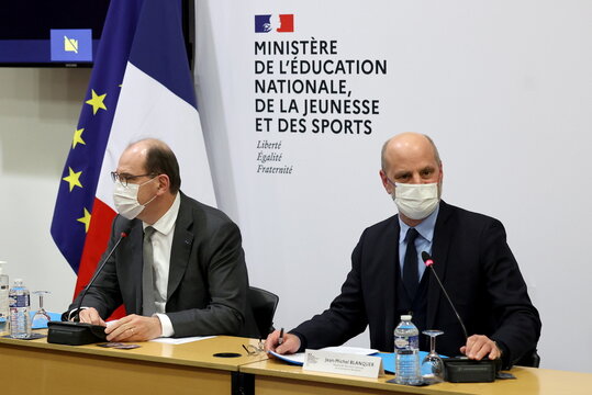 France's Prime Minister Jean Castex (L) and Education, Youth and Sports Minister Jean-Michel Blanquer (R) meet French teachers unions representatives at the Education ministry in Paris