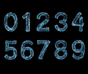 Numbers made with a splashes of water on black background