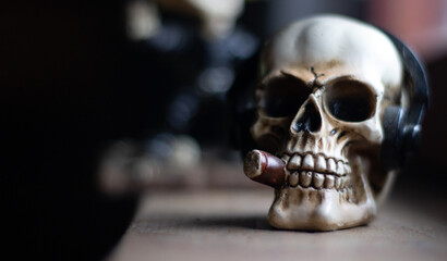 skull with headphones and cigar