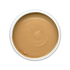 Beige face mask in white container isolated on white