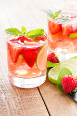 fresh lemonade with strawberries , lime and mint