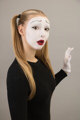 Beautiful girl artist in the role of pantomime. Close-up.