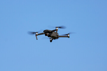 Drone flying. Aerial photo and videography. Unmanned air vehicle.