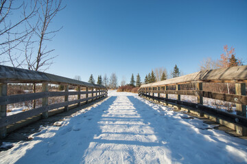 bridge covered in snow on a footpath