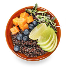 Healthy quinoa bowl with fruits on white background