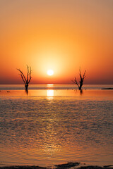 photos of sunsets in Mar Chiquita lagoon.