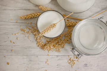 oat milk on wooden background