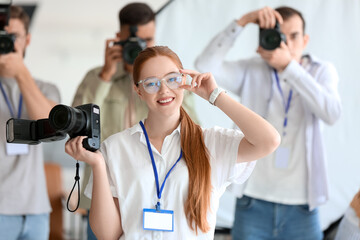 Female photographer during classes in studio