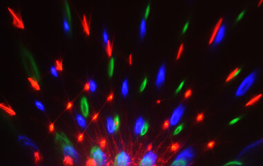 abstract colorful ray lights on dark background