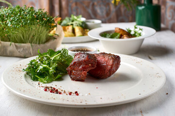 Filet mignon served on a plate in restaurant