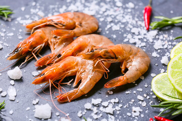 Tasty shrimps on black background