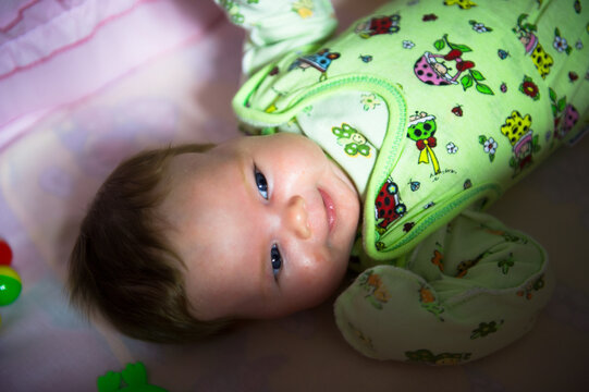 Portrait of cute baby girl with sparkling eyes. High quality photo