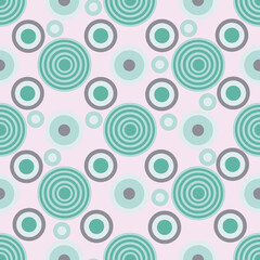 Fototapeta premium Abstract geometric circle seamless pattern. Green circles on pale pink background.