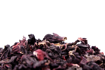 Hibiscus flower red tea karkade, dried petals of Sudanese rose isolated on white