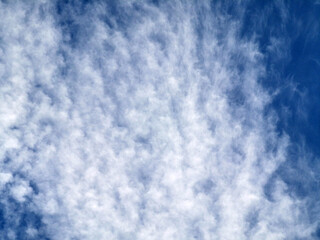Blue sky with spindrift clouds