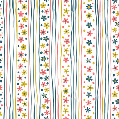 Seamless vector pattern with small flowers and vertical stripes.