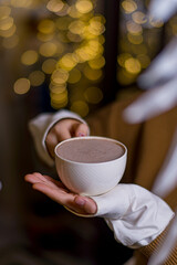 cup of cacao in hands