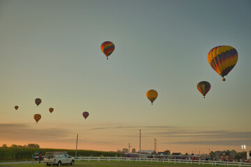 View of Many Hot Air Balloons Getting Ready to Take Off On An Early Morning Balloon Festival