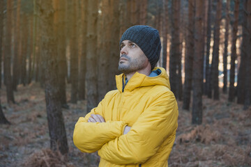 Lonely man thinking in the forest