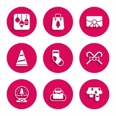 Set Christmas stocking, Cake, Winter scarf, candy cane, snow globe, Party hat, postcard and lights icon. Vector