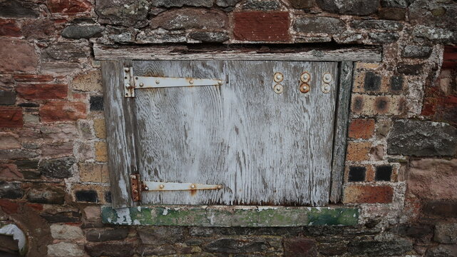 Small Light Blue Door On An Old Cottage