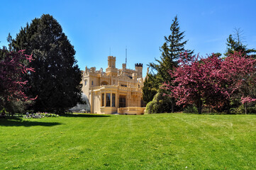 Obraz premium Lednice Castle in South Moravia in the Czech Republic. An important historical monument, the castle belonging to the Liechtensteins in the summer with a blue sky.