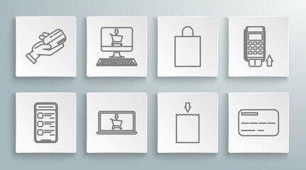 Set line Online shopping on mobile phone, Shopping cart screen computer, laptop, Paper bag, Credit card, Pos terminal with inserted credit and Human hand holding icon. Vector