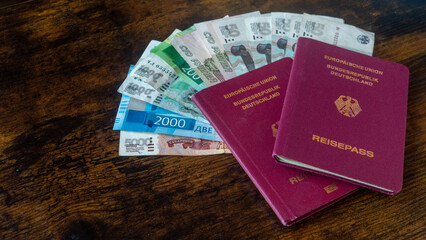 Russian and  german passport. Concept Idea