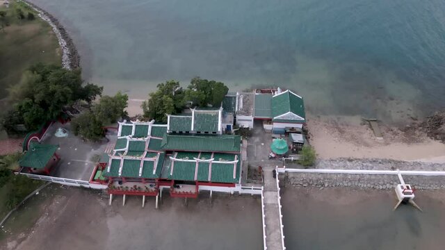 Drone Flying Over Kusu Island Chinese Temple And Pavilion, Southern Islands In Singapore. aerial forward
