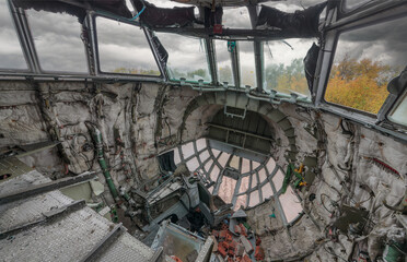 Damaged cockpit of an abandoned cargo plane