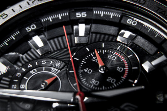 Close up of a classic wrist watch with chronograph and tachymeter