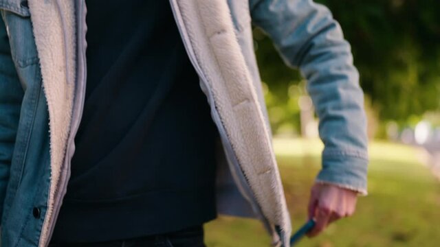 Young hispanic man smiling confident talking on the smartphone at park