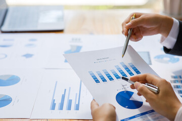 Business team present. Business man hands hold documents with financial statistic stock photo,...