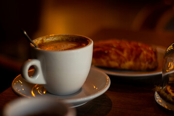 A cozy cafe. Coffee with delicious dessert