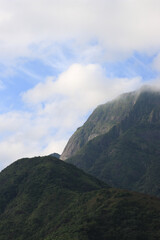 Fototapeta premium Foggy green mountain tops and nature
