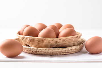 Fresh organic chicken eggs on white background.