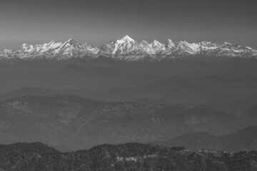 View of high altitude peaks and glacier in the Kumaun Himalayan range in monochrome
