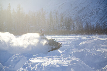 Snowmachine snowmobile rider in Alaska