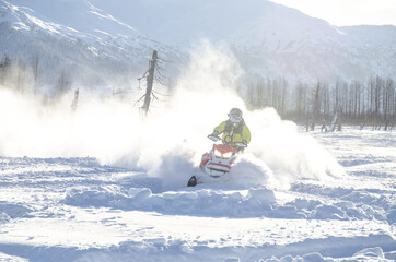 Snowmachine rider in Alaska 