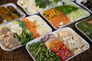 Fresh vegetables in polyethylene polymer foam packaging with plastic wrap