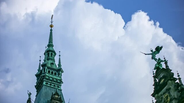 View of movement of clouds over the medieval gothic towers, a popluar tourist destination in Hamburg,Germany in timelapse.
