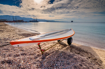 Rescue boat on a sandy beach of the Red Sea in Eilat - famous tourist resort and recreational city...