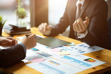 A financial analysts team planning their investment project together.