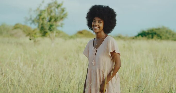 Beautiful happy young black african american woman smiling, afro lifestyle