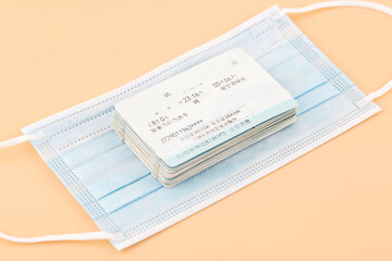 Obraz premium A stack of train tickets with masks
