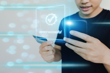 payment successful on virtual screen,man smiling and using mobile phone for shopping online, online business and technology concept