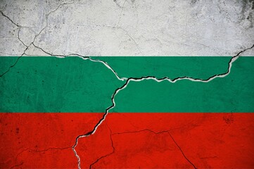 An image of the Bulgaria flag on a wall with a crack.