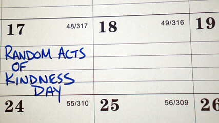 Random Acts of Kindness Day (February 17) written on a calendar. Random Acts of Kindness Day is a...