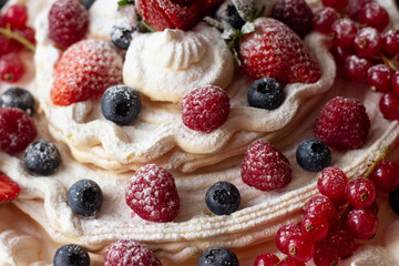 Pavlova cake with fresh berries